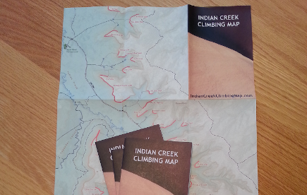 A printed and folded map showing rock climbing and recreation details